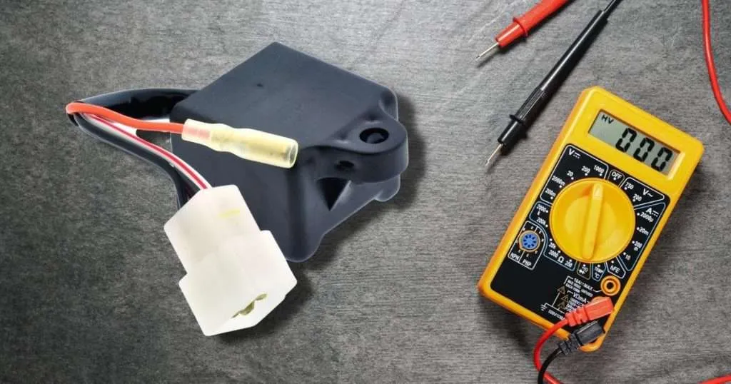 using a multimeter to test a CDI box of motorcycle