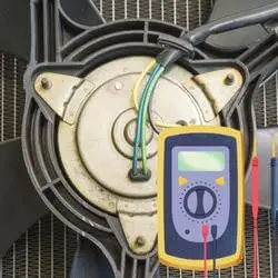 How to test the radiator fan using a multimeter